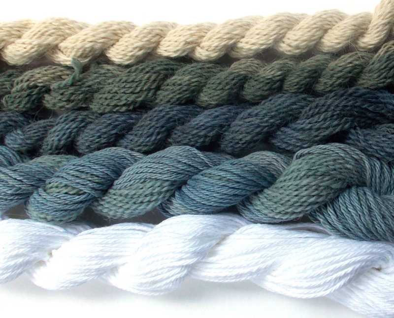 Skeins of yarn dyed with natural black beans