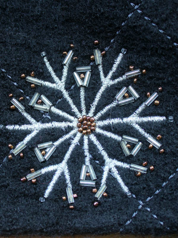 Embroidery and bead Snowflake detail in the old sweater