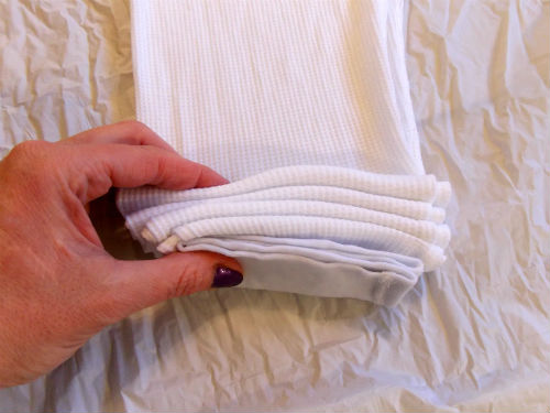 Folding the long johns with the accordion fold method