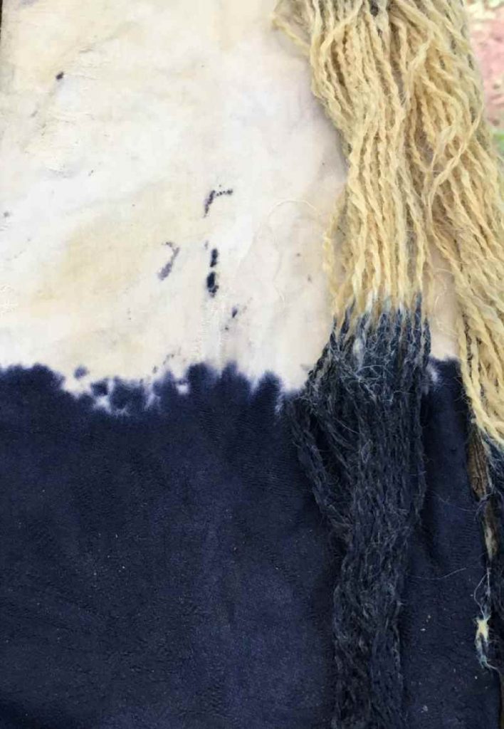 Cotton fabric and wool yarn dyed naturally with Blackberry Leaves and an Iron Modifier