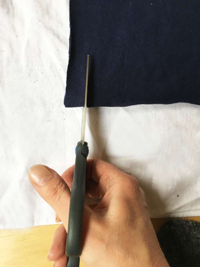 Cutting strips of the old t shirt