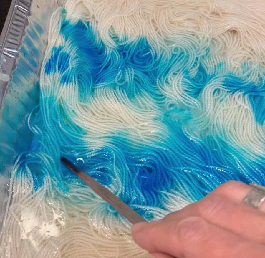 image of yarn with blue dye