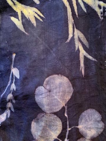 purple fabric with leaf prints